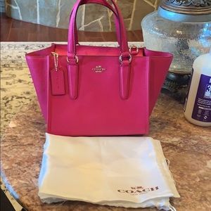 Hot pink COACH Satchel purse.